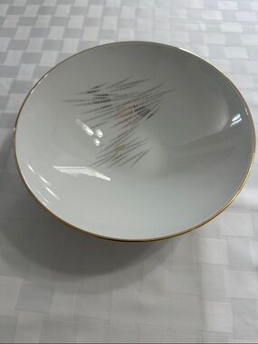White Porcelain Serving Bowl with Gold Rim and Subtle Accent